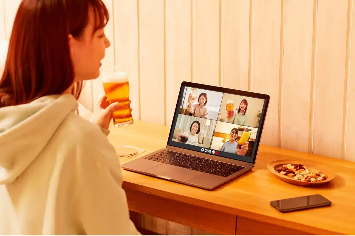 Dual monitor workspace displaying executive email management and client scheduling calendars
